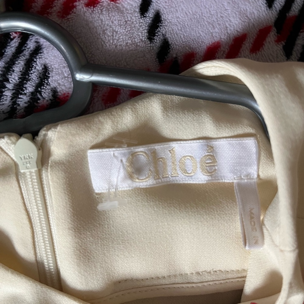 By Chloe, size small, pale yellow color!